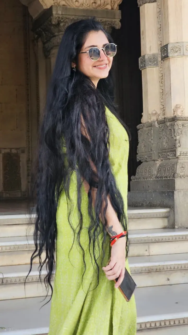 Anu Bais showing natural long, healthy hair
